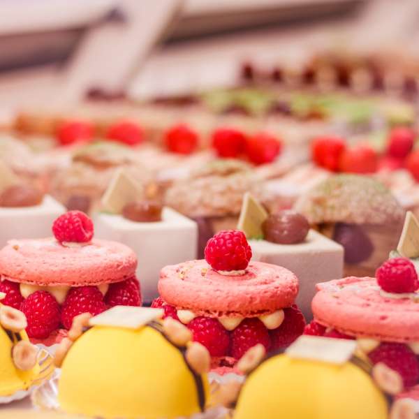 various-beautiful-delicious-pastries-on-a-showcase-in-a-french-shop-.jpg